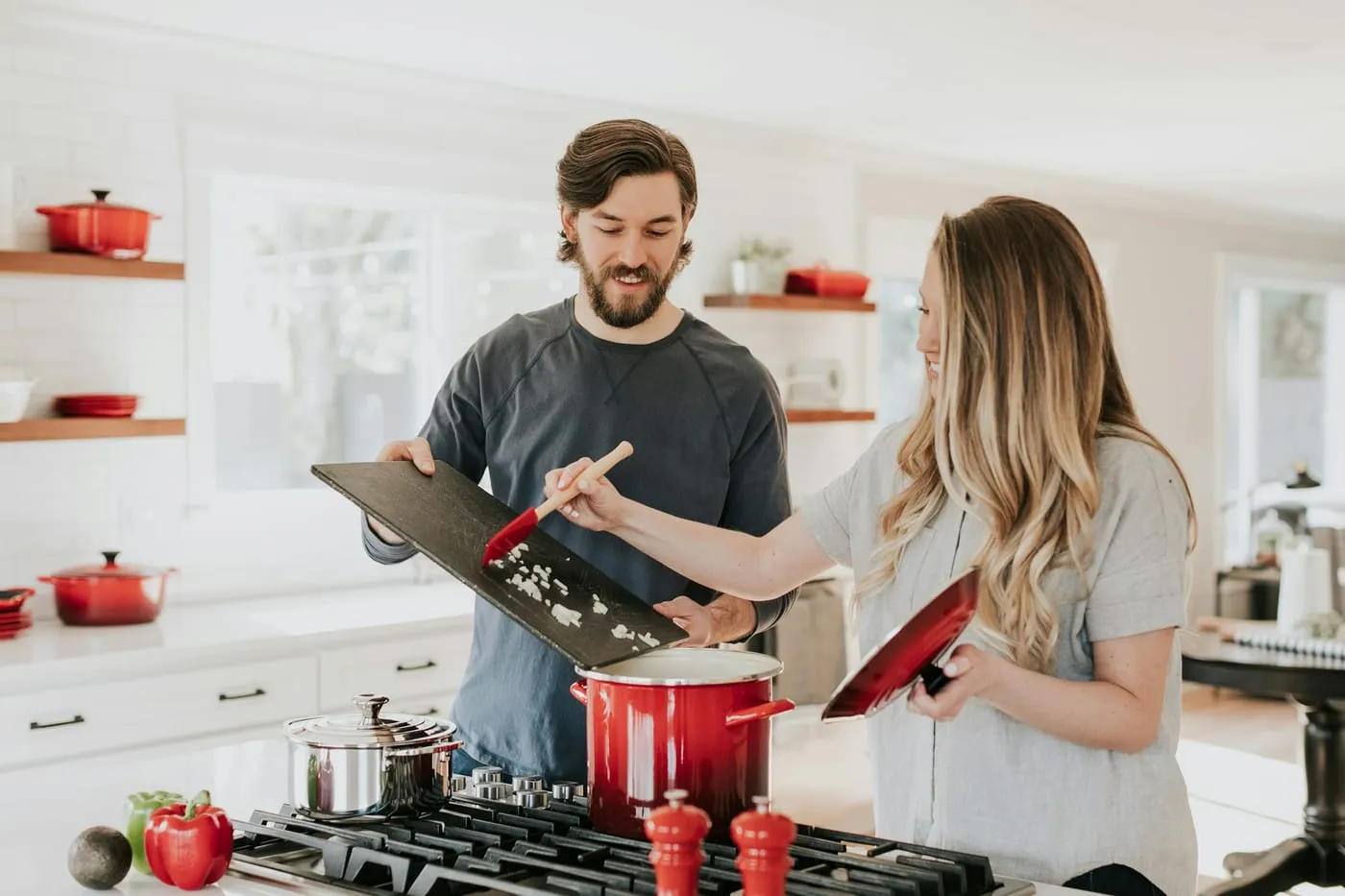 A couple enjoying their move-in-ready renovated kitchen