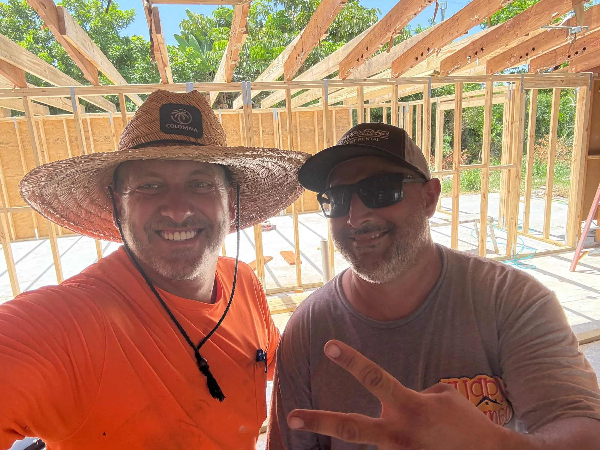 The Flipping Gringo crew at a build in the framing stage